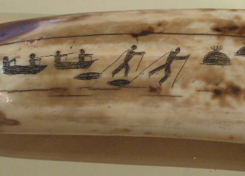 Native American Food: Seal hunting. Engraved walrus tooth, Inuit (crt-01)